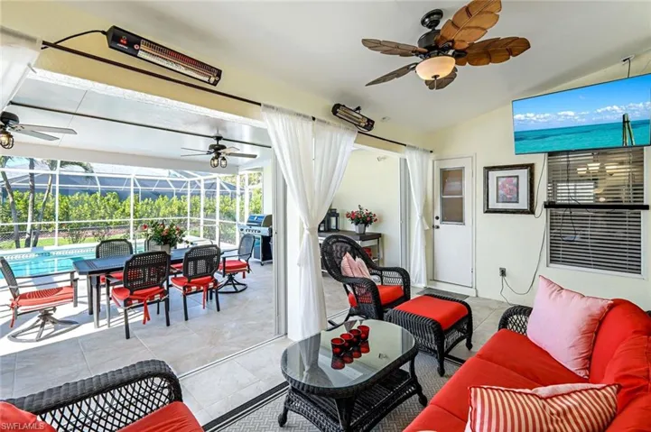The pool deck area has multiple shaded spots for seating and entertaining