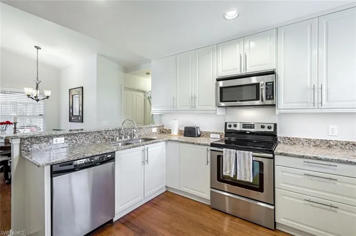 The open plant Kitchen with granite countertops