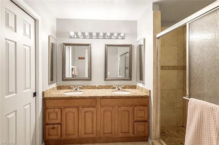 The Master Ensuite Bathroom with twin basins + walk in shower