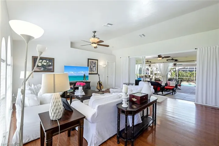The open plan Living area overlooks the pool deck