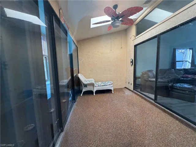 Lake front patio with ceiling fan