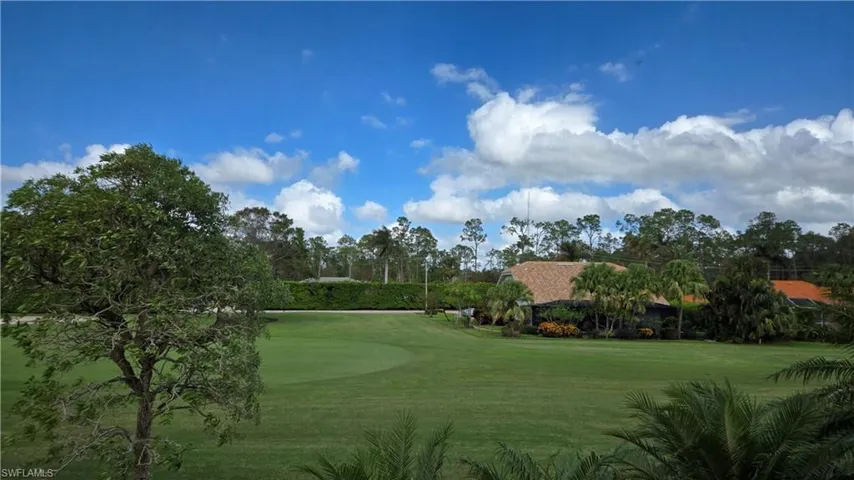 View of golf course and Florida clouds