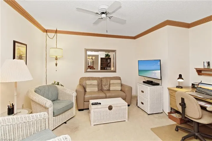 Roomy den with pocket doors that serves as an office, TV room and could be another sleeping room
