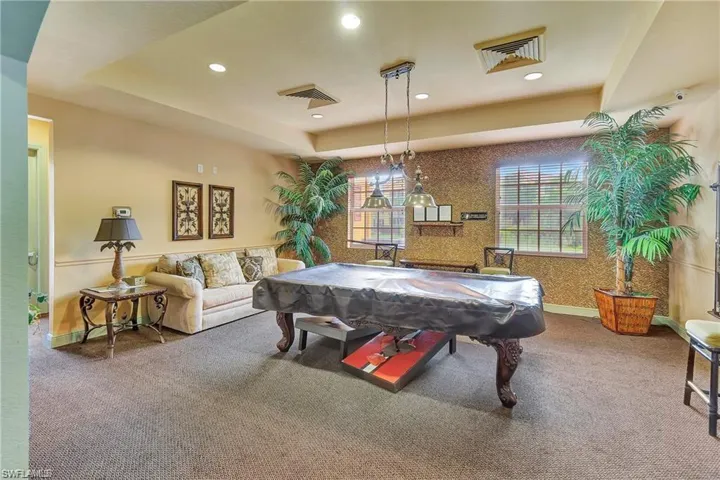 Game room featuring carpet flooring, billiards, and recessed lighting