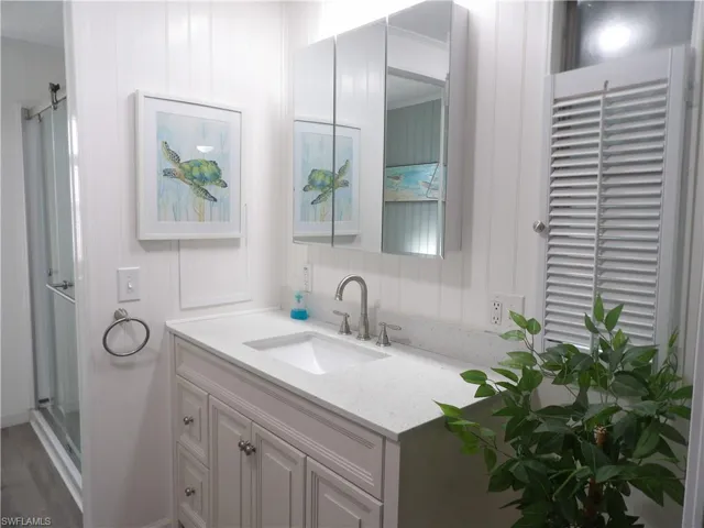 Spacious full primary bathroom with vanity, bidet and a shower