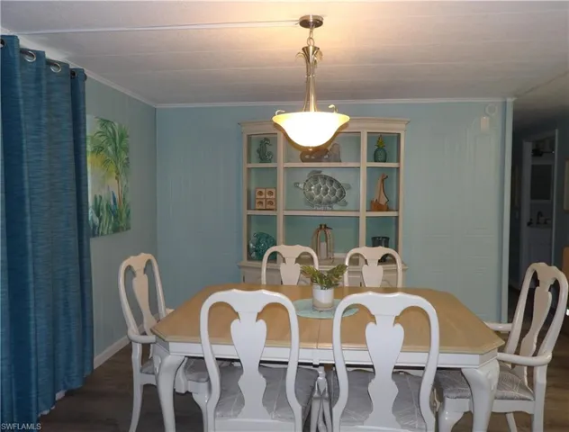 Dining space featuring luxury vinyl flooring