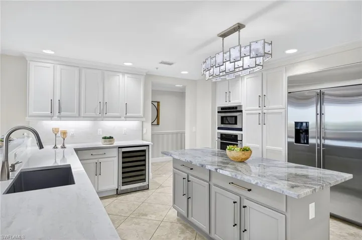 Kitchen with high end SS Appliances, including wine fridge