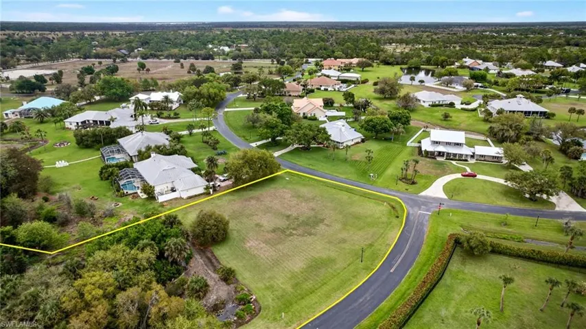 Aerial perspective of suburban area with property boundaries highlighted