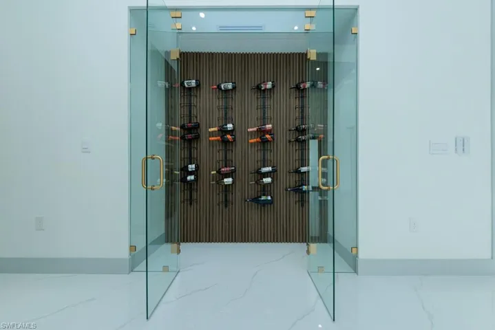 Wine area featuring marble look tiles