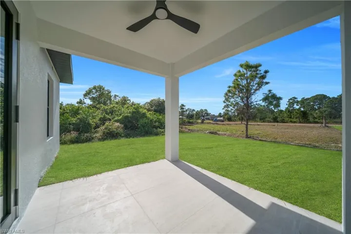 View of patio with a ceiling fan