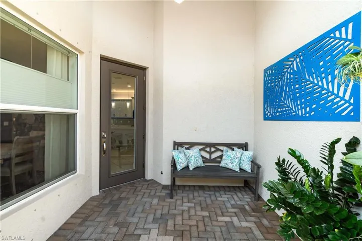 Front Entry with covered sitting area.
