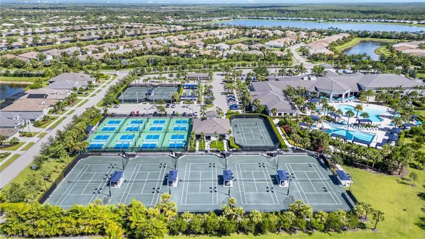 Clubhouse amenities with an aerial views of the tennis and pickleball courts.