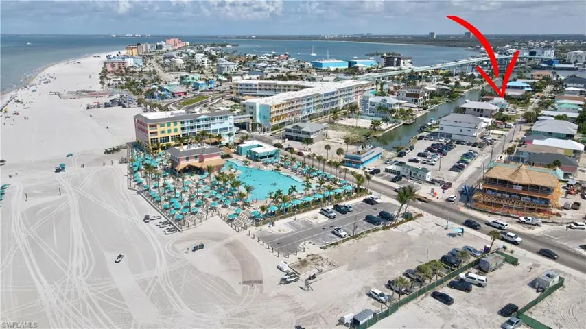 LOCATION! LOCATON! LOCATION! A dream opportunity walk a half a block from your water front lot to Ft Myers Beach, Margaritaville, Time Square the new Beached Whale.