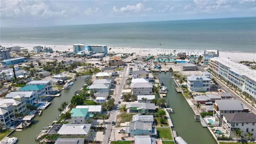 Aerial view of residential area with a nearby body of water