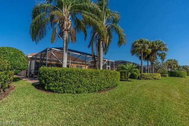 View of yard featuring a lanai