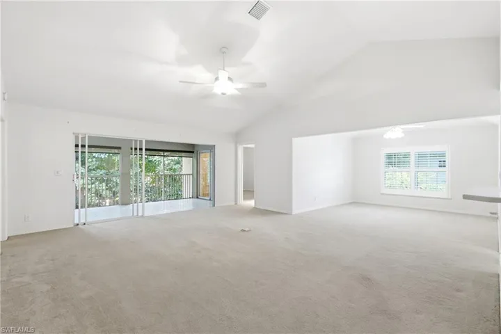 Living room/Great room leading to a private screened lanai
