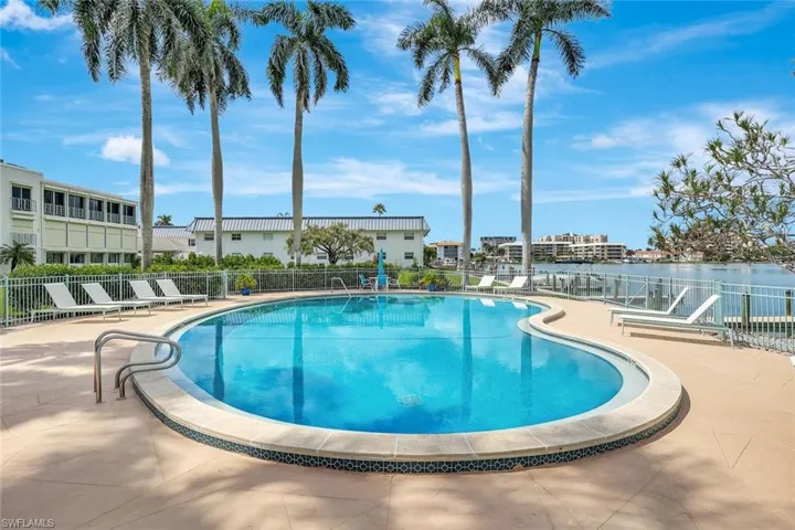Resort Pool, fabulous green space with a beautiful bay view.