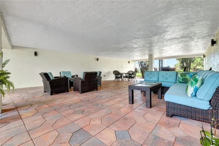 Common Breezeway gathering area, beautiful space for residents to relax and it's covered
