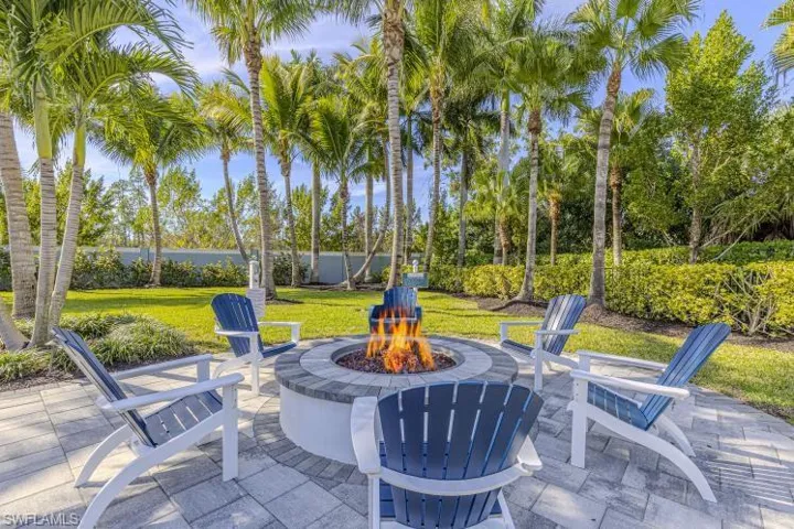 View of patio with a fire pit