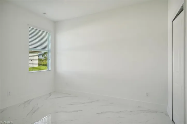 Empty room with tile patterned floors