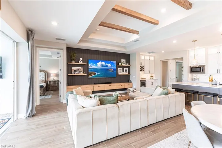 Living room with beam ceiling