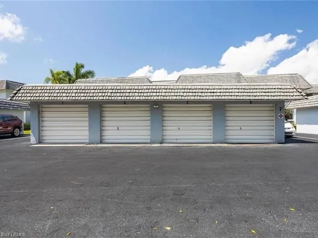 Detached garage located in front of unit