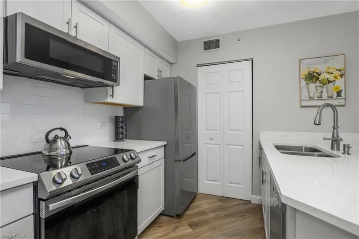 The washer/dryer is on the other side of this door.