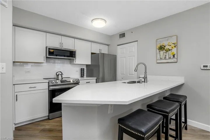 The kitchen has been updated, with all stainless steel appliances in the kitchen.