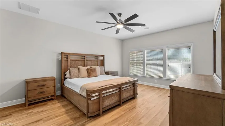 Primary Bedroom with lake views