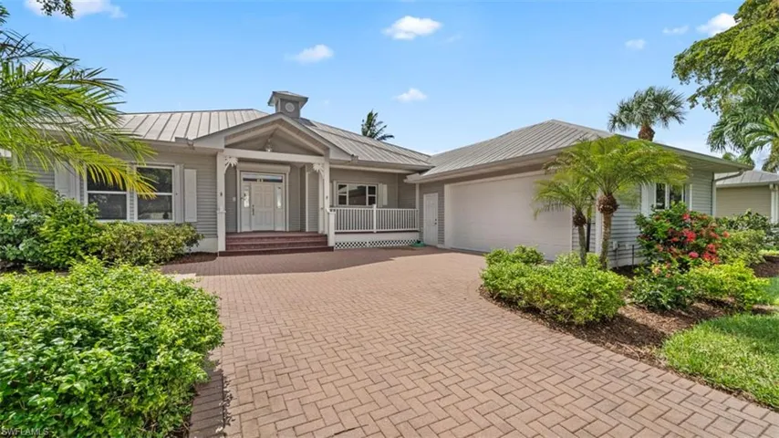 View of front of property with a  side load garage