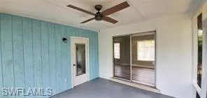 View of patio featuring ceiling fan