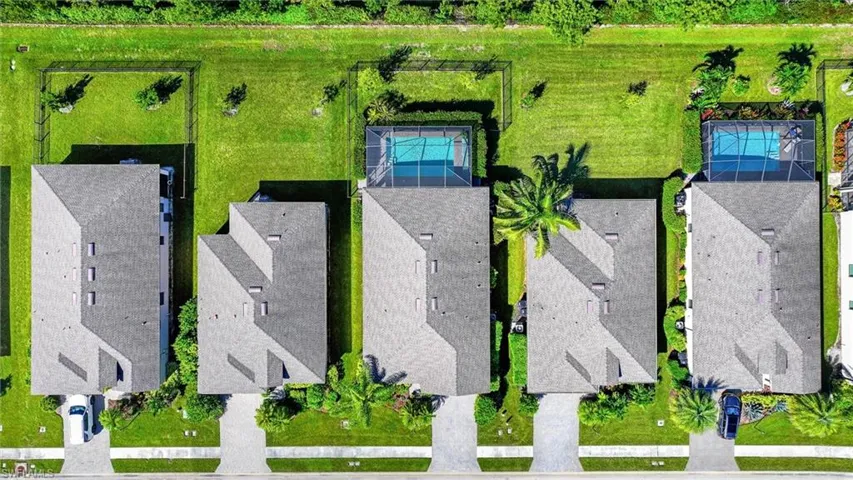 Overhead Aerial View Highlighting the Private Pool, Spacious Backyard, and Property Layout.