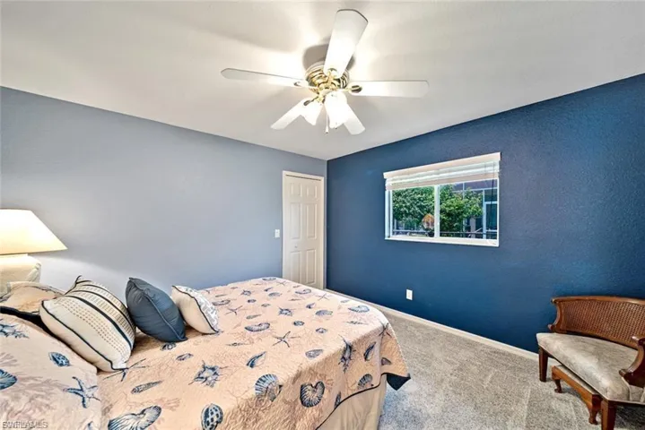 Bedroom with carpet floors and ceiling fan