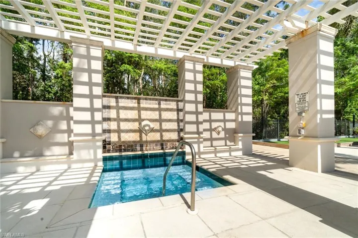 View of swimming pool with a pergola, a patio area, and a pool