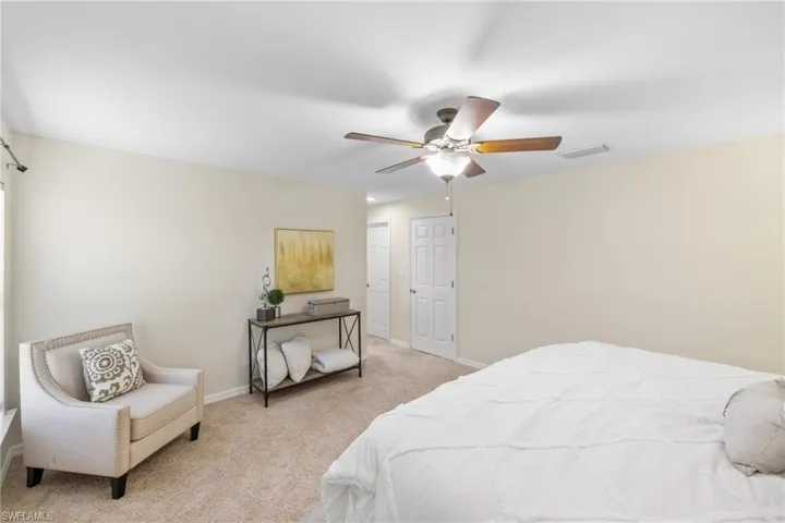 View looking at the entry to the right and the hallway to the walk-in closet and Primary bathroom