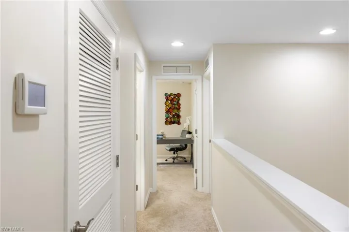 Corridor to guest rooms/office and guest bathroom