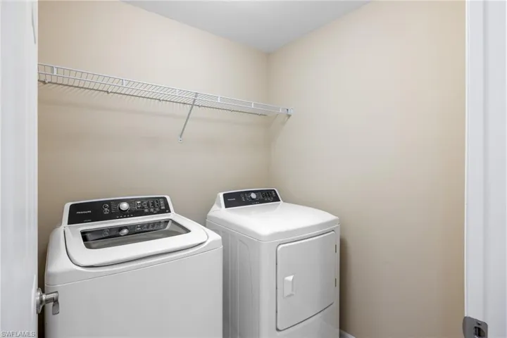 Laundry room featuring washing machine and dryer