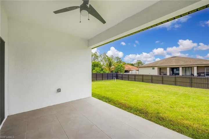 View of patio with ceiling fan