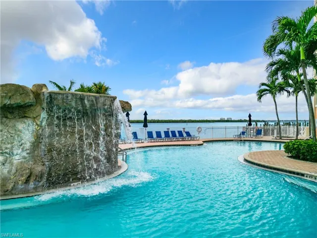 View of pool with pool water feature