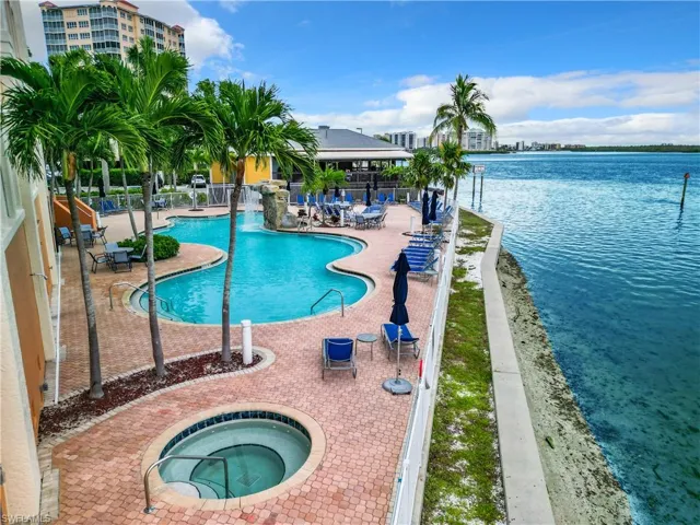 Swimming pool with the bay side hot tub