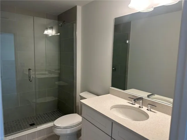 Guest bathroom with full length shower