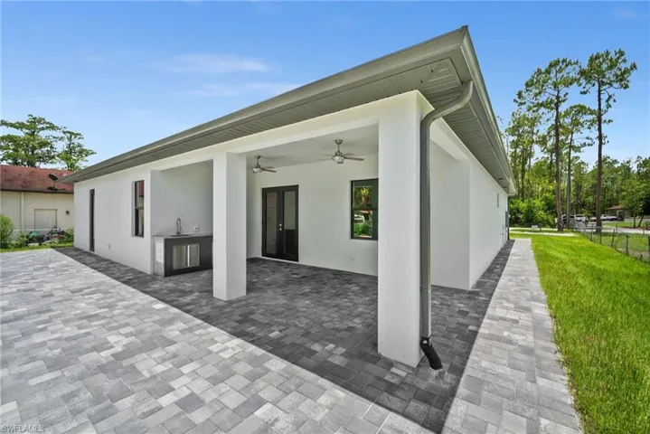 View of patio featuring a ceiling fan and area for grilling