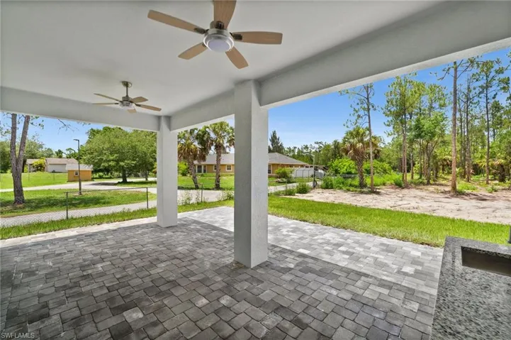 View of patio / terrace with ceiling fan