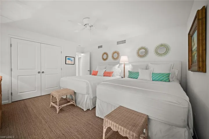 Guest bedroom 2 is also oversized with a large, double door closet and hurricane sliders to the private patio!