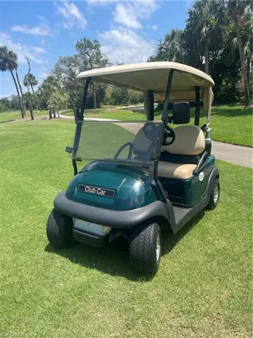 Club Car golf cart, golf cart garage and covered parking area included as well as a separate double door locked storage area!
