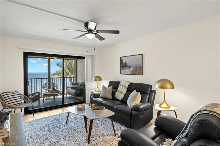 Living area featuring a water view