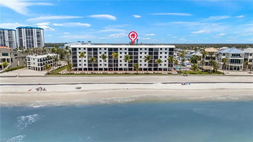 Bird's eye view featuring a view of the beach and a water view