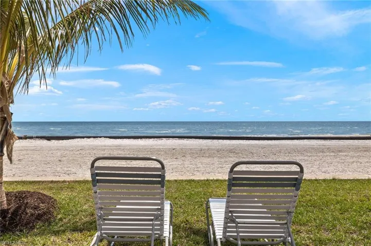 View of water feature featuring a beach view