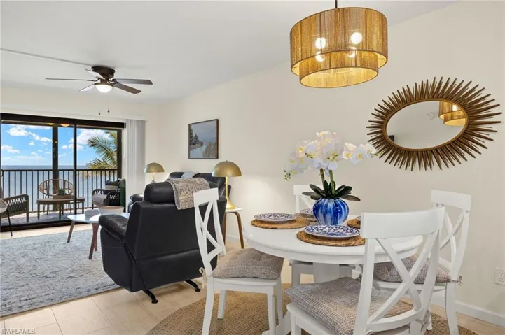 Dining area featuring a water view
