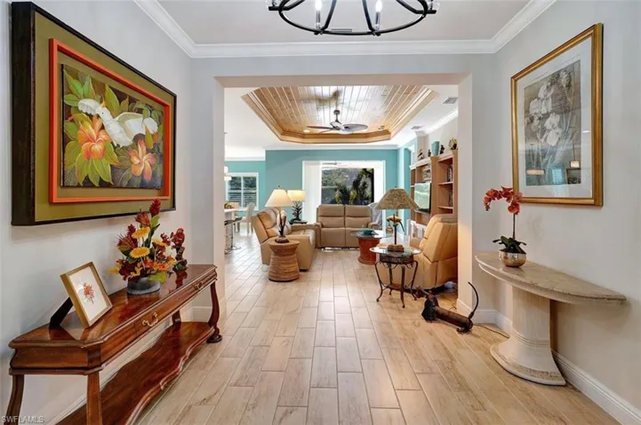 Walk from the front foyer to the atrium & to the family room with back slider.